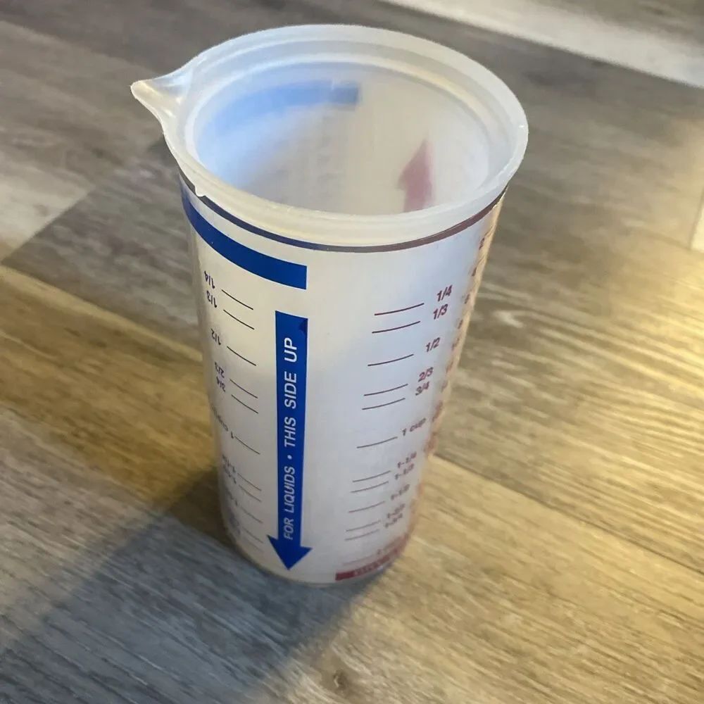 The Pampered Chef Measure-All Dry/Wet Measuring 2 Cup Push-Up Design #2225
